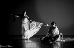 Black and white dramatic image of Gillian performing with Adnan Jahangir