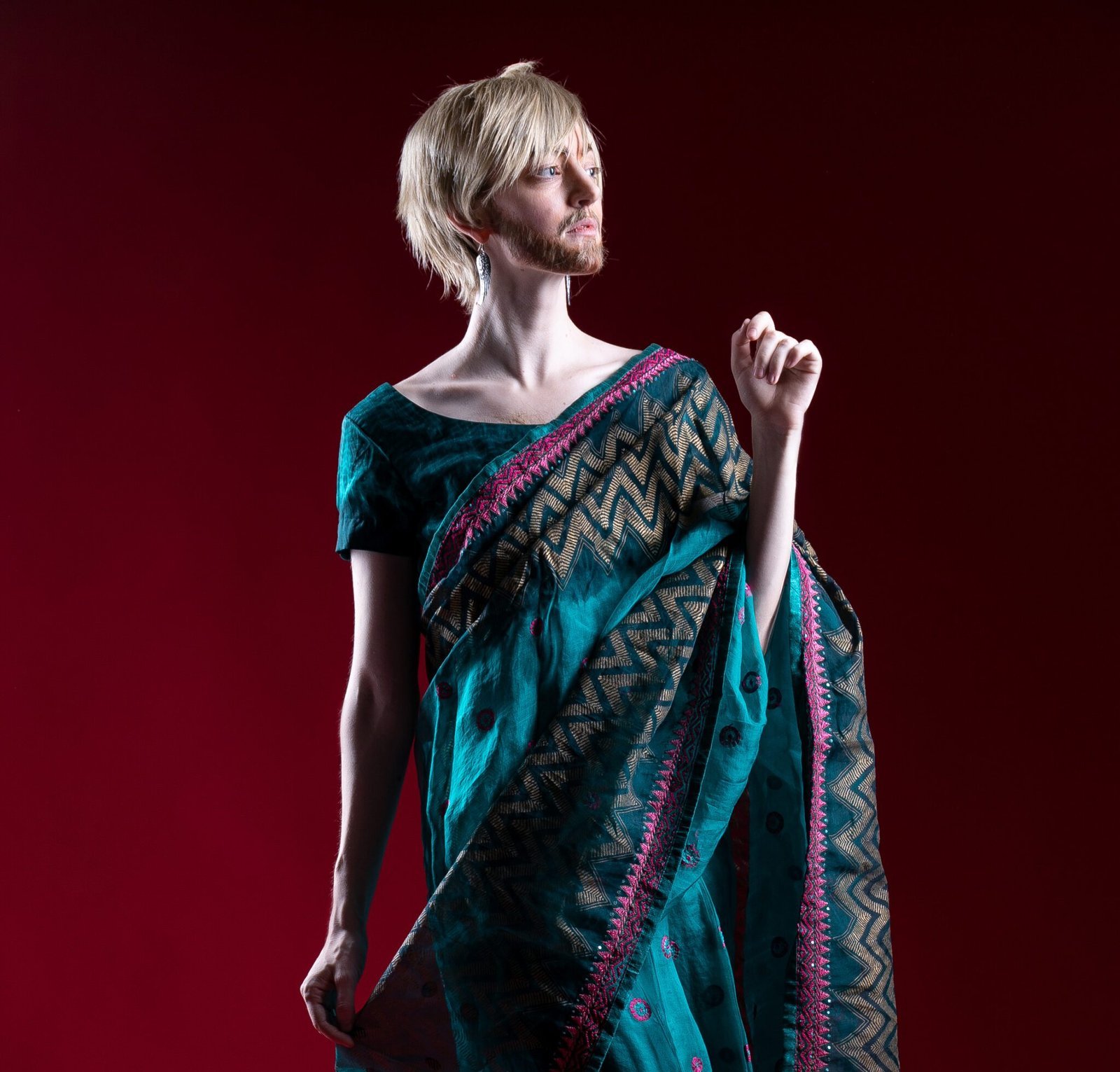 gillian as a man wearing a teal sari
