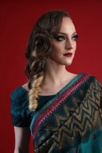 Gillian in a sari looking to the right