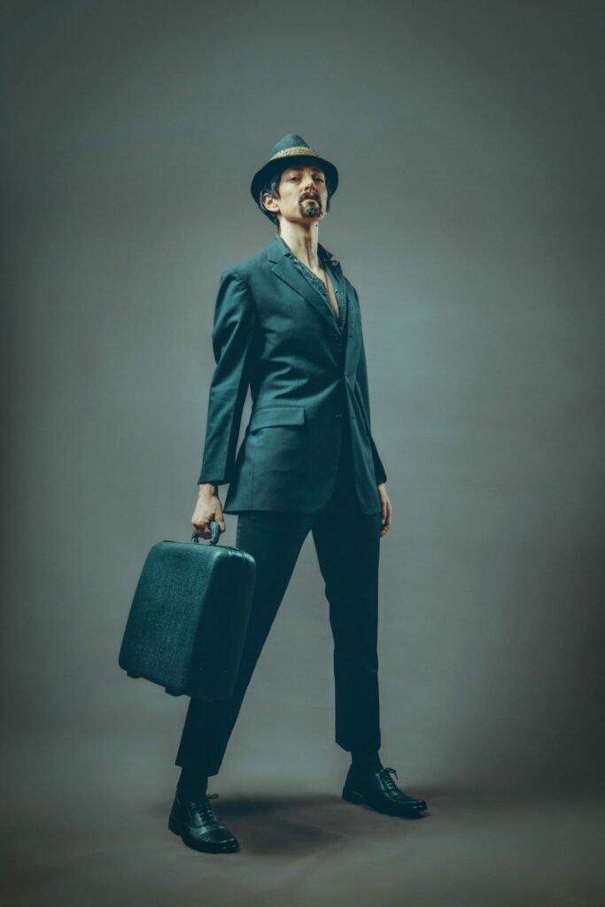 Gillian as the man in the suit