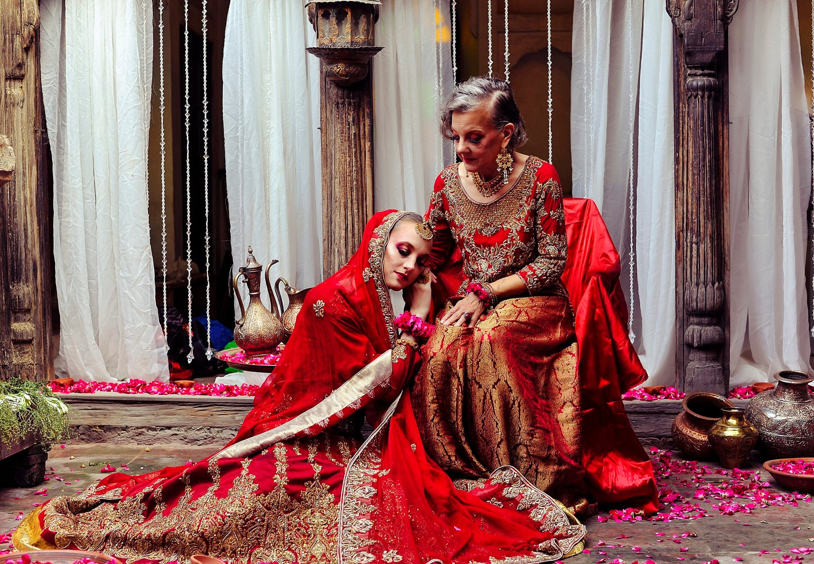 Gillian as a Pakistani bride with her head on her mother's lap